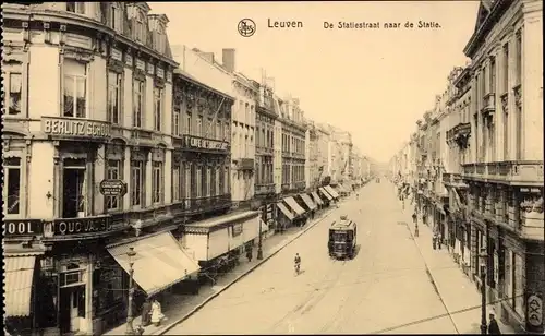 Ak Louvain Leuven Flämisch Brabant, Rue de la Station, Straßenbahn, Quo Vadis, Berlitz School