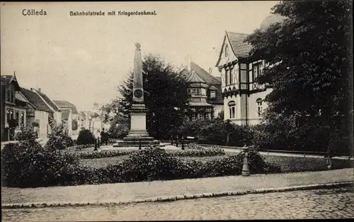 Ak Cölleda Kölleda in Thüringen, Bahnhofstraße mit Kriegerdenkmal