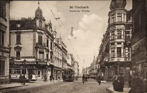 Ak Mönchengladbach am Niederrhein, Krefelder Straße, Geschäft Krüger & Oberbeck, Straßenbahnen