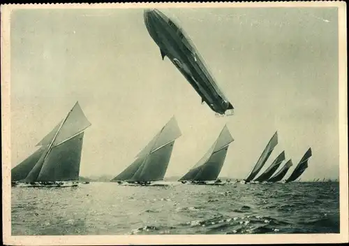 Ak Zeppelin Luftschiff LZ 11 Viktoria Luise über dem Meer, Kieler Woche, Segelboote