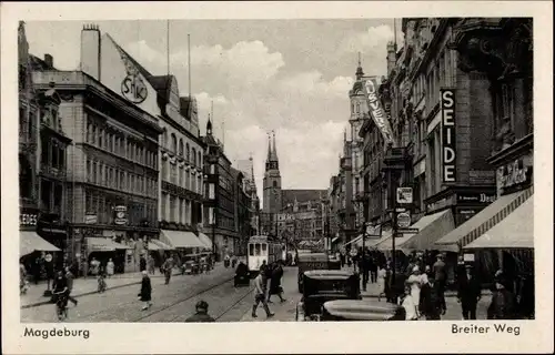 Ak Magdeburg an der Elbe, Breiter Weg, Straßenbahn, Geschäft Seide