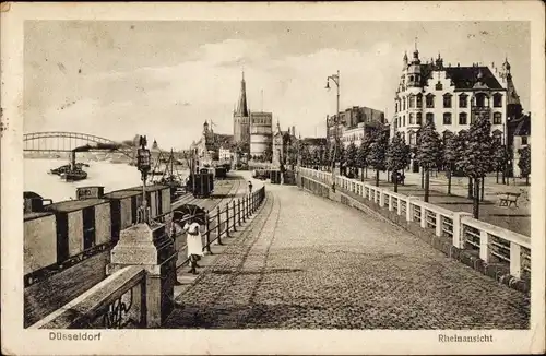 Ak Düsseldorf, Rheinansicht, Uferpromenade, Dampfschiff, Gütereisenbahn, Kirche