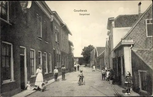 Ak Gouderak Südholland, Dorpstraat, Kinder, Dreirad