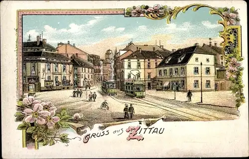 Litho Zittau in der Oberlausitz, Straßenpartie, Straßenbahnen