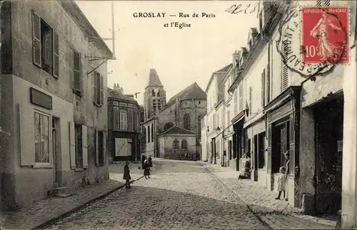 Ak Groslay Val d'Oise, Rue de Paris et l'Église