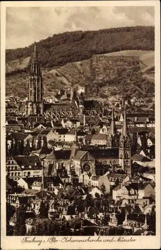 Ak Freiburg im Breisgau, Ortspartie mit Johanniskirche und Münster