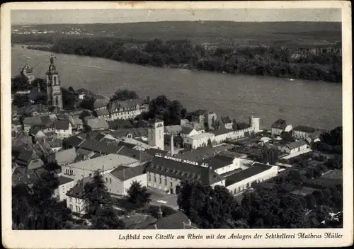 Ak Eltville am Rhein Hessen, Luftbild von der Stadt und Rhein, Anlagen der Sektkellerei Müller