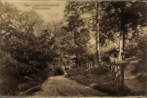 Ak Langenschwalbach Bad Schwalbach im Taunus, Eberterunner, Waldweg, Zaun, Hütte
