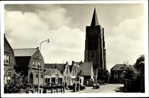 Ak Oostkapelle Walcheren Zeeland, Straßenansicht mit Kirche