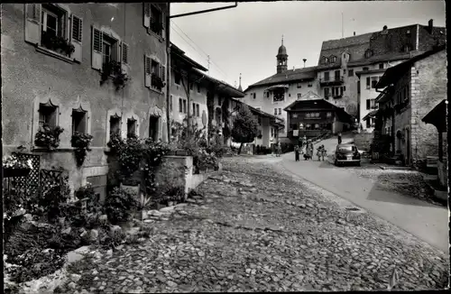 Ak Gruyères Kanton Freiburg Schweiz, La rue