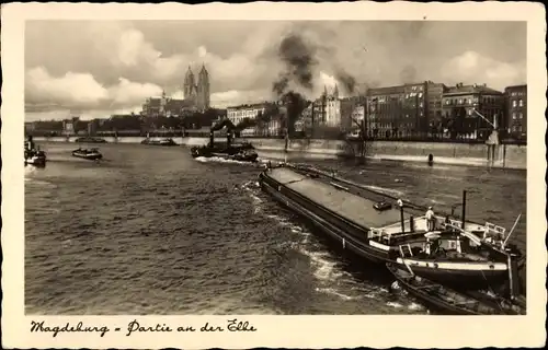 Ak Magdeburg an der Elbe, Salondampfer und Frachtschiffe auf der Elbe