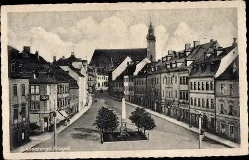 Ak Schneeberg im Erzgebirge, Straßenpartie, Häuser, Kirche