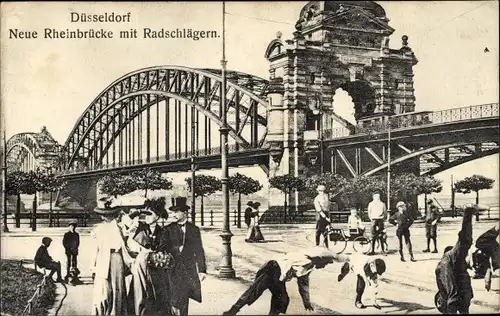 Ak Düsseldorf am Rhein, Neue Rheinbrücke mit Radschlägern