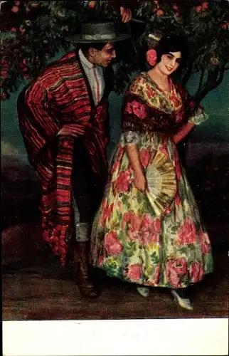 Künstler Ak Cardona, J., Entre naranjos, Paar in spanischen Trachten