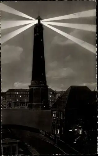 Ak Insel Borkum Ostfriesland, Leuchtturm bei Nacht