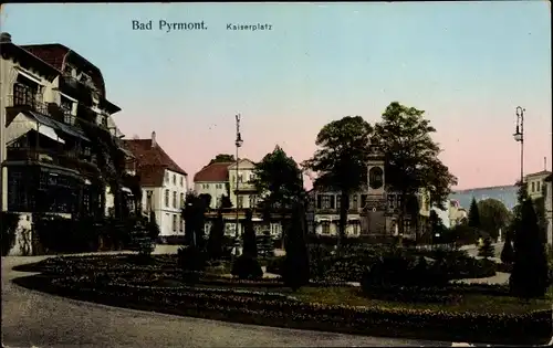 Leuchtfenster Ak Bad Pyrmont in Niedersachsen, Kaiserplatz, Denkmal, Grünanlagen, Wohnhäuser