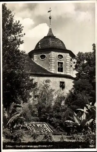 Ak Zittau in der Oberlausitz, Stadtgärtnerei mit Blumenuhr