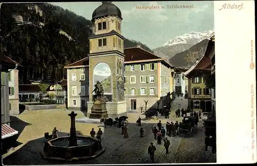 Ak Altdorf Kt. Uri Schweiz, Hauptplatz und Telldenkmal, Berge, Brunnen