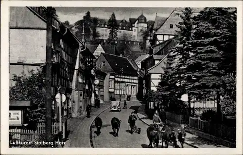 Ak Stolberg im Harz, Straßenszene, Passanten, Kutsche