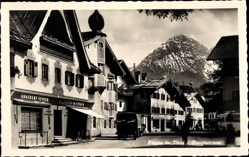 Ak Reutte Tirol, Hauptstraße mit Friseur A. Singer
