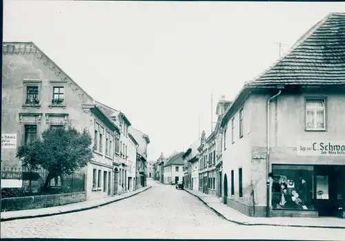 Foto Triptis in Thüringen, Straßenpartie, Geschäft C. Schwa...