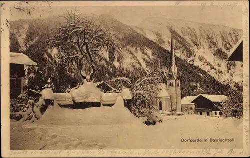 Ak Bayrischzell im Mangfallgebirge Oberbayern, Dorfpartie, Kirche, Winteransicht