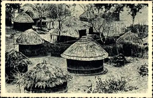 Ak Rhodesien Simbabwe, Un kraal, Strohhütten