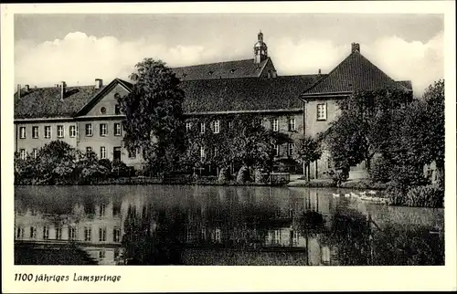 Ak Lamspringe in Niedersachsen, Gebäude vom Wasser aus, 1100 jähriges Lamspringe