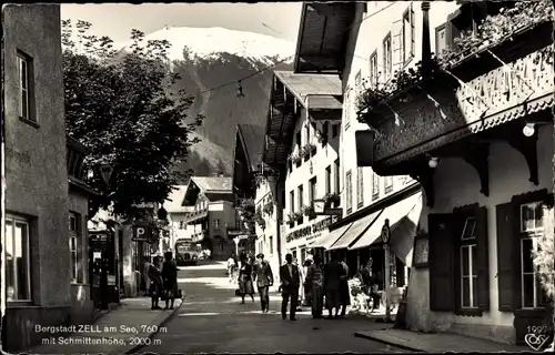 Ak Zell am See in Salzburg, Stadtansicht, Schmittenhöhe, Straßenpartie, Passanten