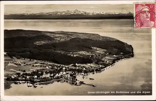 Ak Unteruhldingen Uhldingen Mühlhofen Bodenseekreis, Fliegeraufnahme vom Ortsteil mit See und Alpen