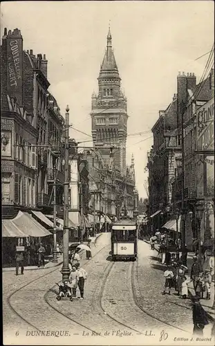 Ak Dunkerque Dünkirchen Nord, La Rue de l'Eglise, Straßenbahn
