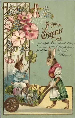 Präge Ak Glückwunsch Ostern, Hasenfrau mit Schubkarre, Ostereier, Hasenkind, Kleeblätter