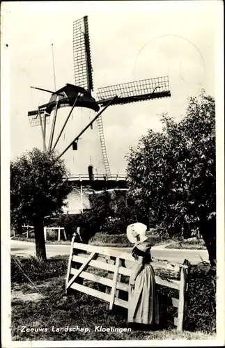 Ak Zeeland Niederlande, Zeeuwsch Landschap, Molen, Windmühle, Frau in Tracht