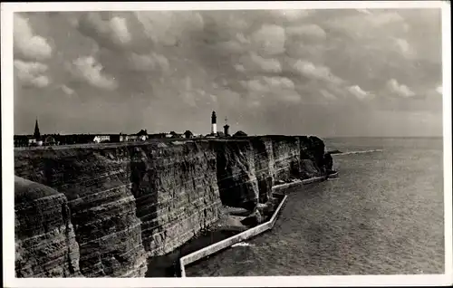Ak Nordseeinsel Helgoland, Westküste mit Leuchtturm