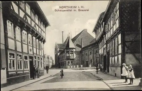 Ak Northeim in Niedersachsen, Kinder am Schaupenstiel, Fachwerkhäuser, Erker, Brauerei
