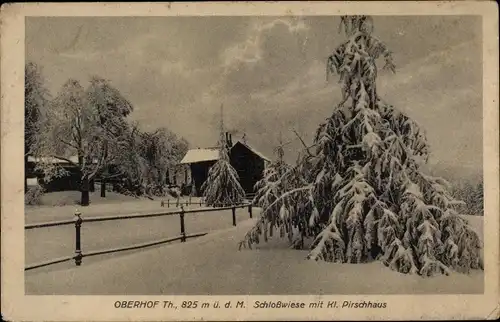 Ak Oberhof im Thüringer Wald, Schlosswiese mit kl. Pirschhaus, Winteransicht