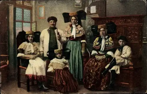 Ak Familienmitglieder in Elsässer Tracht, Wohnstube