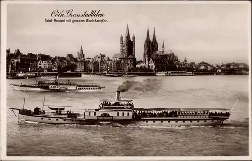 Ak Köln am Rhein, Großstadtleben, Totalansicht der Ortschaft mit Rheindampfer