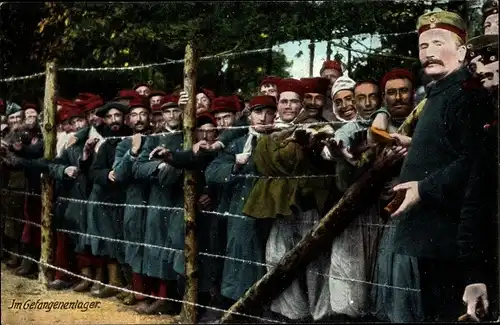 Ak Im Gefangenenlager, Französische Kriegsgefangene hinter dem Zaun