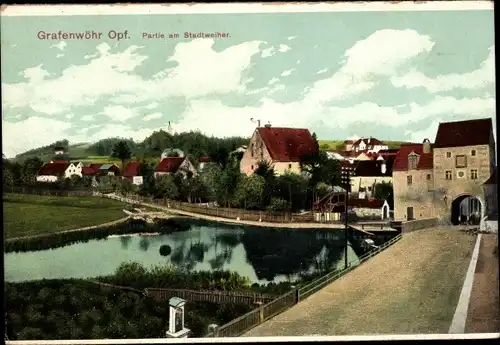 Ak Grafenwöhr in der Oberpfalz Bayern, Straßenpartie am Stadtweiher, Stadttor