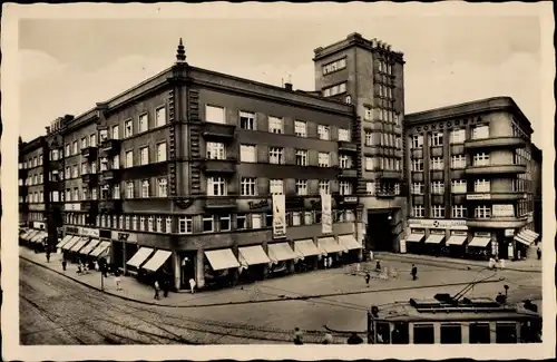 Ak Slezská Ostrava Polnisch Ostrau Reg Mährisch Schlesien, Straßenpartie, Gebäude, Tram