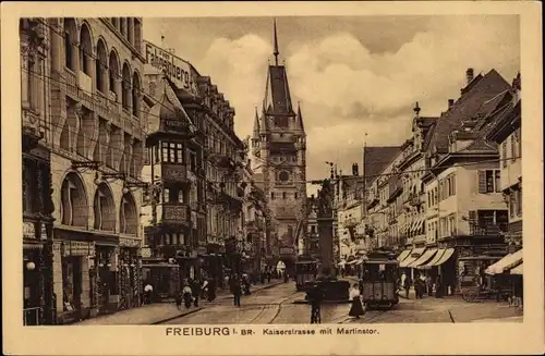 Ak Freiburg im Breisgau, Kaiserstraße mit Martinstor, Straßenbahnen, Geschäfte