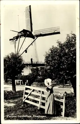 Ak Zeeland Niederlande, Zeeuwsch Landschap, Molen, Windmühle, Frau in Tracht