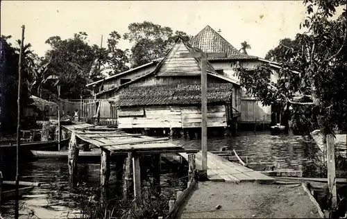 Foto Ak Singapore Singapur, Dorfpartie, Häuser am Wasser