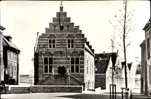 Ak Woudrichem Nordbrabant, Wohnhäuser, Straßenpartie