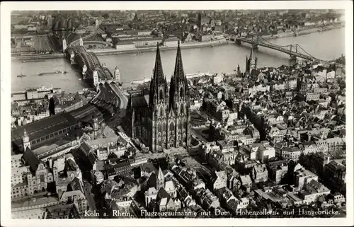 Ak Köln am Rhein, Dom, Hohenzollernbrücke, Hängebrücke, Fliegeraufnahme