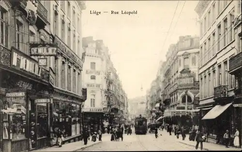 Ak Liège Lüttich Wallonien, Rue Leopold, Geschäfte, Straßenbahn