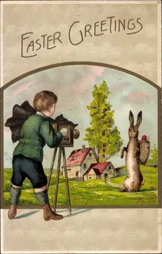 Ak Glückwunsch Ostern, Junge fotografiert einen Hasen, Fotoapparat