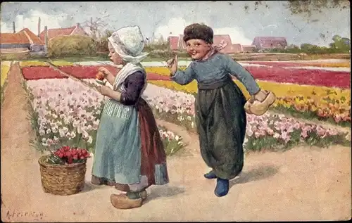 Künstler Ak Feiertag, Karl, Junge und Mädchen in niederländischen Trachten, Tulpenfeld