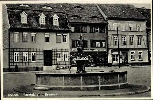 Ak Kölleda in Thüringen, Marktplatz mit Brunnen